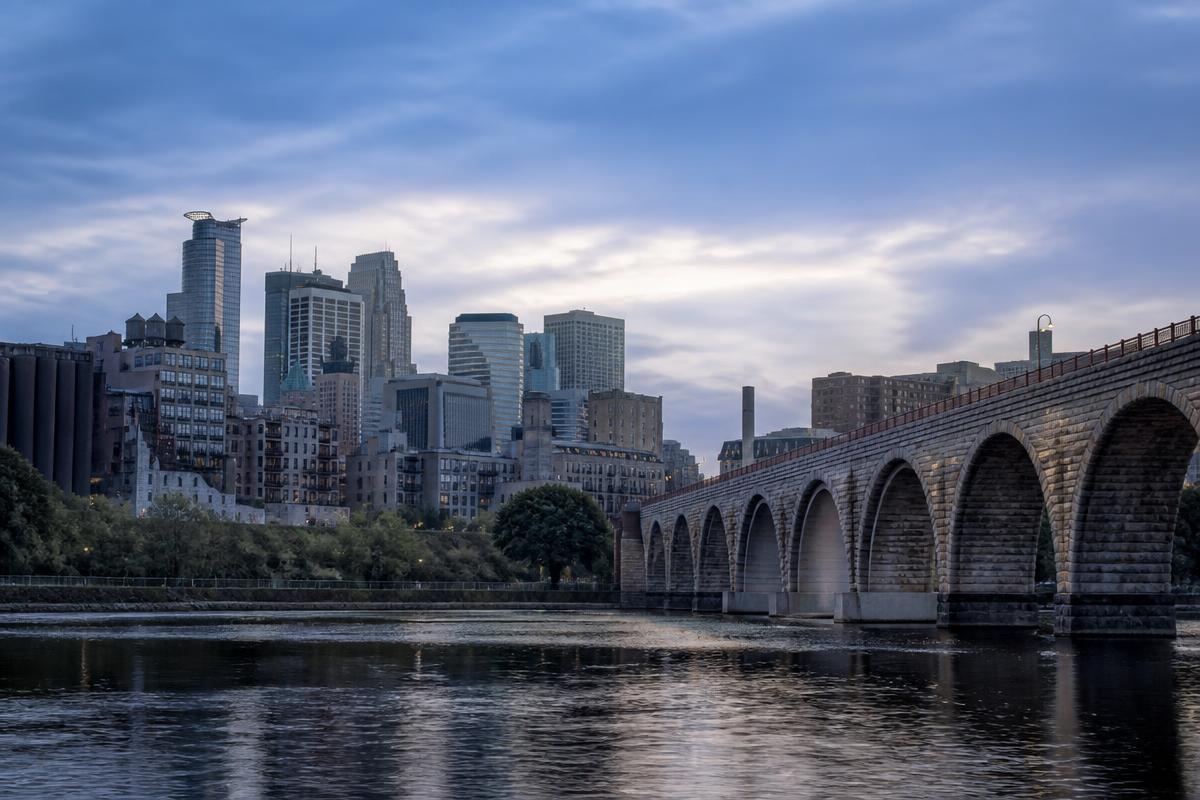 Minneapolis skyline and the Stone Arch Bridge over the Mississippi River